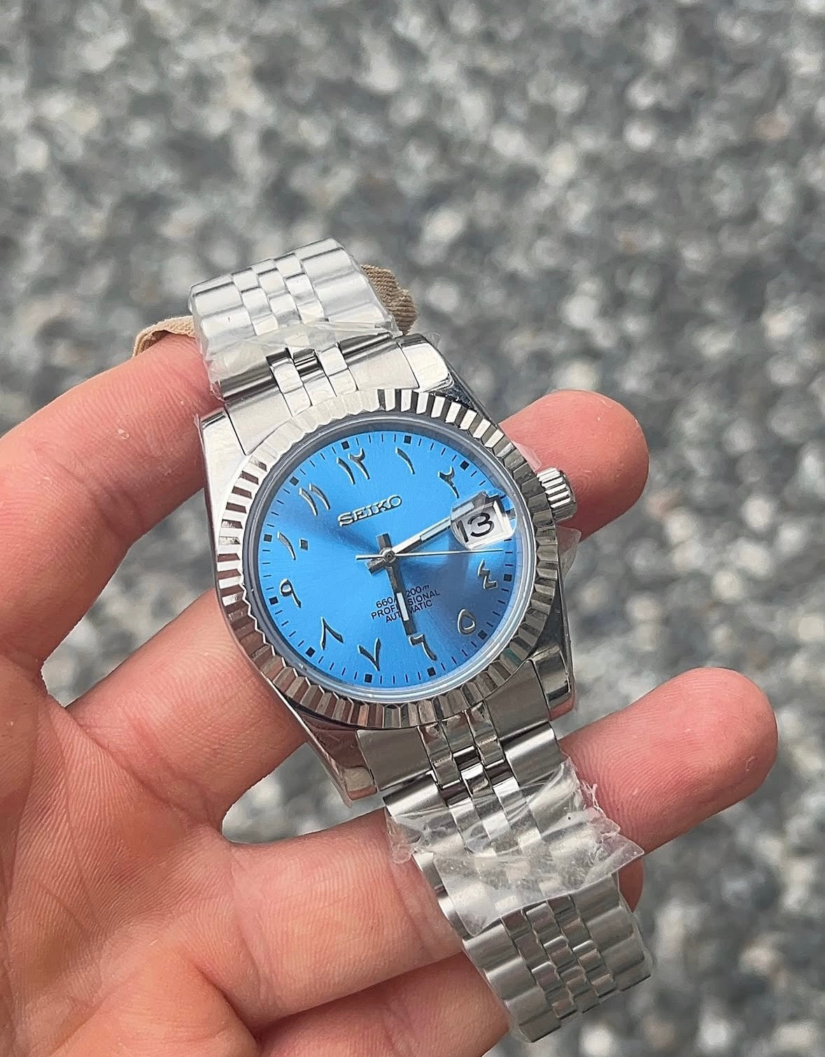 Seikojust - baby blue arabic dial