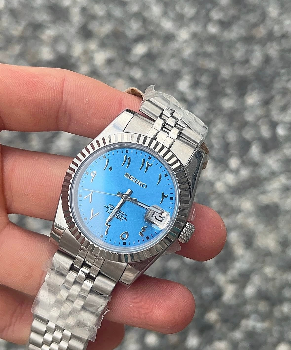 Seikojust - baby blue arabic dial