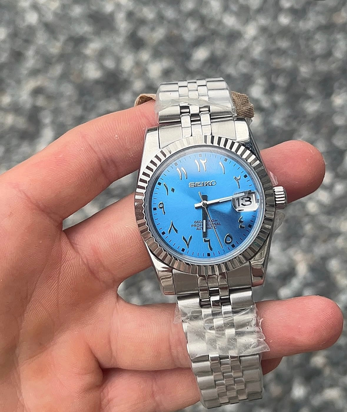 Seikojust - baby blue arabic dial