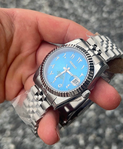 Seikojust - baby blue arabic dial